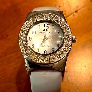 Denacci glitzy bangle watch with light blue patent wrapped bracelet.